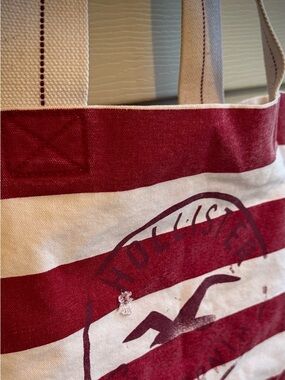 HOLLISTER CO. VINTAGE RED AND WHITE STRIPED CANVAS TOTE W/ RED SEAGULL LOGO
